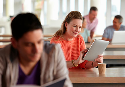 People working in an breakout office. 